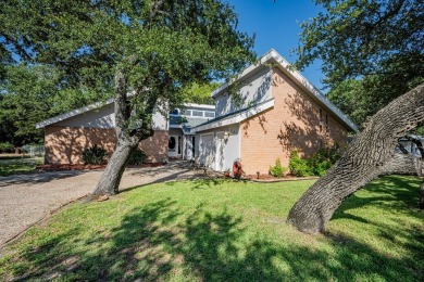 Lamar Peninsula Retreat under Majestic Coastal Oaks.  Nestled on Lamar Golf Course in Texas - for sale on GolfHomes.com, golf home, golf lot