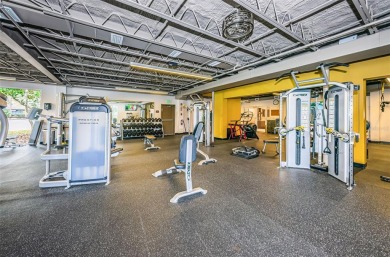 Trying to downsize but don't want to feel cramped? Step into the on East Lake Woodlands Country Club in Florida - for sale on GolfHomes.com, golf home, golf lot