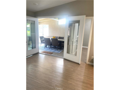 Gorgeous corner drive-up unit adorned with lovely exterior tile on Leisure World Seal Beach Golf Course in California - for sale on GolfHomes.com, golf home, golf lot