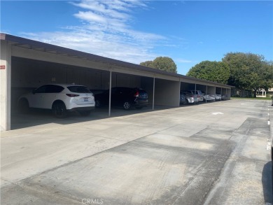 Gorgeous corner drive-up unit adorned with lovely exterior tile on Leisure World Seal Beach Golf Course in California - for sale on GolfHomes.com, golf home, golf lot
