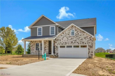 Welcome to your dream home at 836 Buckingham Drive, Lagrange in on Grey Hawk Golf Club in Ohio - for sale on GolfHomes.com, golf home, golf lot