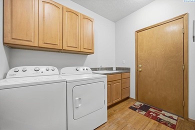 MLS# 288805 Beautiful Custom Home located in Kennewick. Nestled on Canyon Lakes Golf Course in Washington - for sale on GolfHomes.com, golf home, golf lot