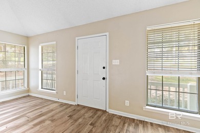 Discover this charming Daphne home in Lake Forest Subdivision! on Lake Forest Yacht and Country Club in Alabama - for sale on GolfHomes.com, golf home, golf lot