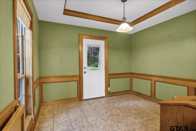 Welcome to your new home in the beautifully gated Hideaway Lake on Hide-A-Way Lake Golf Course in Texas - for sale on GolfHomes.com, golf home, golf lot
