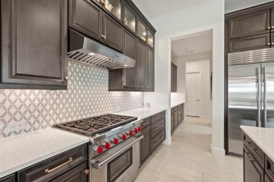 Experience the height of luxury in this stunning Avalon home on Wildhorse Golf Club of Robson Ranch in Texas - for sale on GolfHomes.com, golf home, golf lot