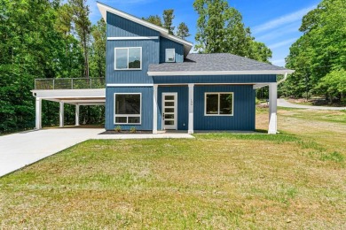 DO IT TODAY AND NOT SOMEDAY! This contemporary newly constructed on The Trail At Chickasaw Pointe in South Carolina - for sale on GolfHomes.com, golf home, golf lot
