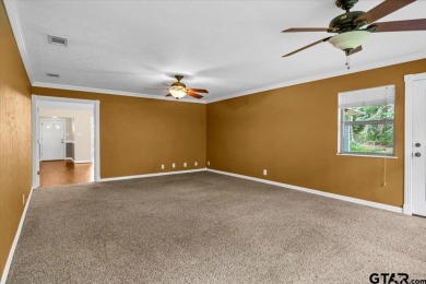 Welcome to your new home in the beautifully gated Hideaway Lake on Hide-A-Way Lake Golf Course in Texas - for sale on GolfHomes.com, golf home, golf lot