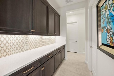 Experience the height of luxury in this stunning Avalon home on Wildhorse Golf Club of Robson Ranch in Texas - for sale on GolfHomes.com, golf home, golf lot