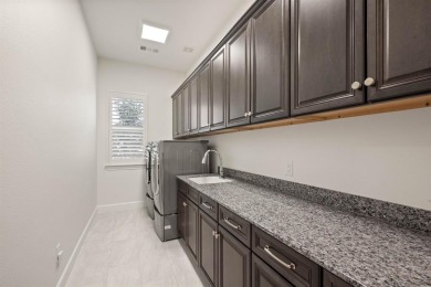 Experience the height of luxury in this stunning Avalon home on Wildhorse Golf Club of Robson Ranch in Texas - for sale on GolfHomes.com, golf home, golf lot