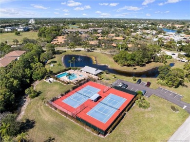 This classic home in the prestigious Heritage Ridge Golf on Heritage Ridge Golf Club in Florida - for sale on GolfHomes.com, golf home, golf lot