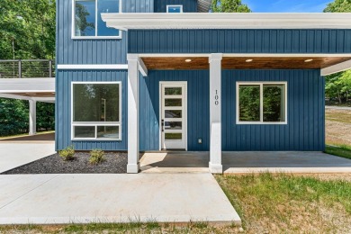 DO IT TODAY AND NOT SOMEDAY! This contemporary newly constructed on The Trail At Chickasaw Pointe in South Carolina - for sale on GolfHomes.com, golf home, golf lot