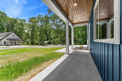 DO IT TODAY AND NOT SOMEDAY! This contemporary newly constructed on The Trail At Chickasaw Pointe in South Carolina - for sale on GolfHomes.com, golf home, golf lot