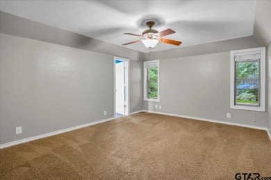 Welcome to your new home in the beautifully gated Hideaway Lake on Hide-A-Way Lake Golf Course in Texas - for sale on GolfHomes.com, golf home, golf lot