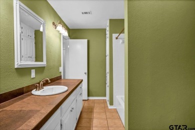 Welcome to your new home in the beautifully gated Hideaway Lake on Hide-A-Way Lake Golf Course in Texas - for sale on GolfHomes.com, golf home, golf lot