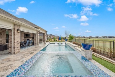 Experience the height of luxury in this stunning Avalon home on Wildhorse Golf Club of Robson Ranch in Texas - for sale on GolfHomes.com, golf home, golf lot