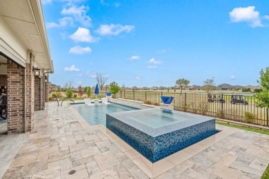 Experience the height of luxury in this stunning Avalon home on Wildhorse Golf Club of Robson Ranch in Texas - for sale on GolfHomes.com, golf home, golf lot