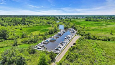 Charleston inspired architecture in Litchfield Plantation. This on Willbrook Plantation Golf Club in South Carolina - for sale on GolfHomes.com, golf home, golf lot
