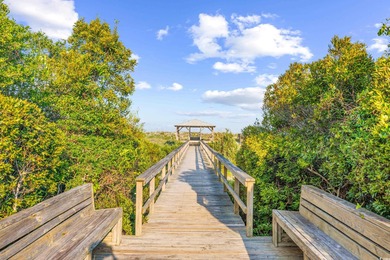 Charleston inspired architecture in Litchfield Plantation. This on Willbrook Plantation Golf Club in South Carolina - for sale on GolfHomes.com, golf home, golf lot