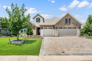 Experience the height of luxury in this stunning Avalon home on Wildhorse Golf Club of Robson Ranch in Texas - for sale on GolfHomes.com, golf home, golf lot