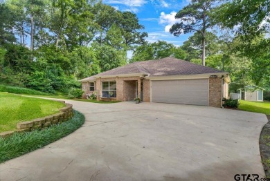 Welcome to your new home in the beautifully gated Hideaway Lake on Hide-A-Way Lake Golf Course in Texas - for sale on GolfHomes.com, golf home, golf lot