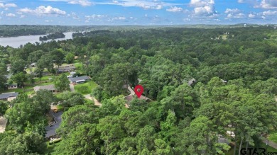 Welcome to your new home in the beautifully gated Hideaway Lake on Hide-A-Way Lake Golf Course in Texas - for sale on GolfHomes.com, golf home, golf lot