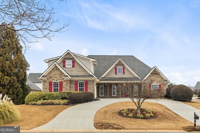 Discover elegance and comfort in this stunning home nestled in on Traditions of Braselton Golf Club in Georgia - for sale on GolfHomes.com, golf home, golf lot