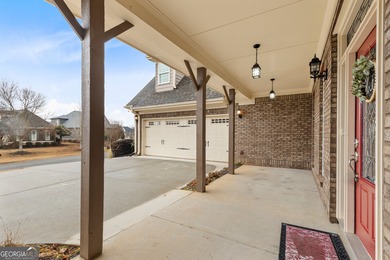 Discover elegance and comfort in this stunning home nestled in on Traditions of Braselton Golf Club in Georgia - for sale on GolfHomes.com, golf home, golf lot