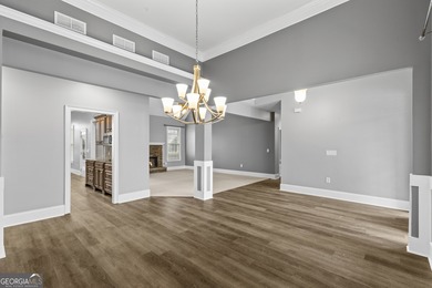 Discover elegance and comfort in this stunning home nestled in on Traditions of Braselton Golf Club in Georgia - for sale on GolfHomes.com, golf home, golf lot