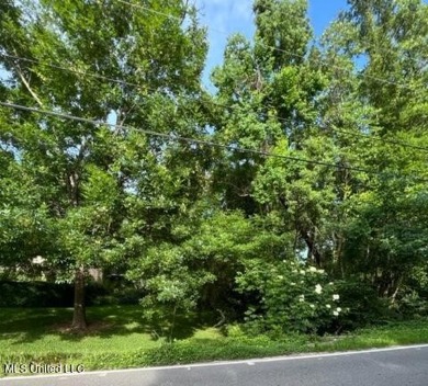 Nestled in the charming Gulf Hills community in Ocean Springs on Gulf Hills Golf Club in Mississippi - for sale on GolfHomes.com, golf home, golf lot