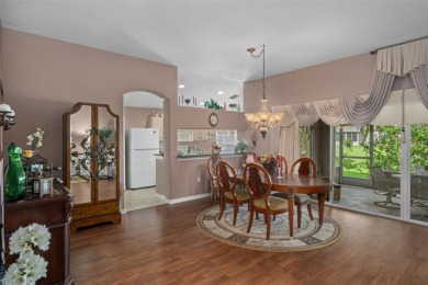 This end-unit Sea Breeze Villa nestled within Pine Meadow on Heritage Pines Country Club in Florida - for sale on GolfHomes.com, golf home, golf lot