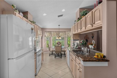 This end-unit Sea Breeze Villa nestled within Pine Meadow on Heritage Pines Country Club in Florida - for sale on GolfHomes.com, golf home, golf lot
