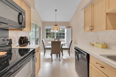 YOU'LL INSTANTLY FEEL AT HOME WHEN YOU STEP INTO THIS VAULTEDV on The Boca Country Club in Florida - for sale on GolfHomes.com, golf home, golf lot