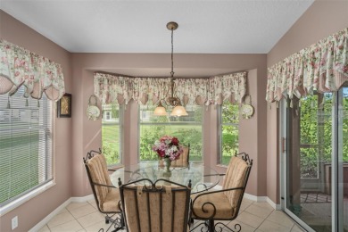 This end-unit Sea Breeze Villa nestled within Pine Meadow on Heritage Pines Country Club in Florida - for sale on GolfHomes.com, golf home, golf lot