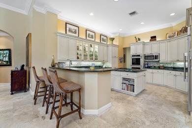 Luxury meets tranquility in this stunning 3,794sf 4-bedroom on BallenIsles Golf and Country Club in Florida - for sale on GolfHomes.com, golf home, golf lot