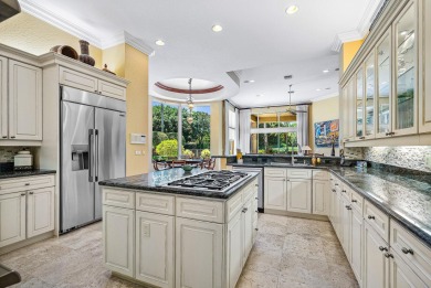 Luxury meets tranquility in this stunning 3,794sf 4-bedroom on BallenIsles Golf and Country Club in Florida - for sale on GolfHomes.com, golf home, golf lot