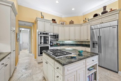 Luxury meets tranquility in this stunning 3,794sf 4-bedroom on BallenIsles Golf and Country Club in Florida - for sale on GolfHomes.com, golf home, golf lot