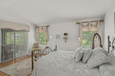 This end-unit Sea Breeze Villa nestled within Pine Meadow on Heritage Pines Country Club in Florida - for sale on GolfHomes.com, golf home, golf lot