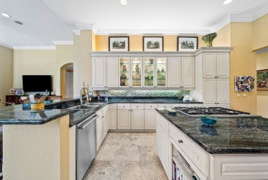 Luxury meets tranquility in this stunning 3,794sf 4-bedroom on BallenIsles Golf and Country Club in Florida - for sale on GolfHomes.com, golf home, golf lot