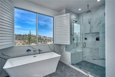 This stunning home has been completely remodeled from top to on Calabasas Golf and Country Club in California - for sale on GolfHomes.com, golf home, golf lot