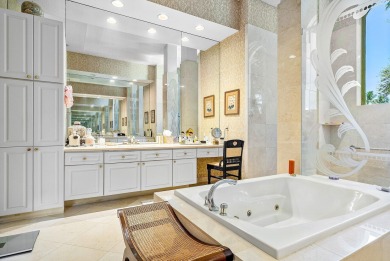 Luxury meets tranquility in this stunning 3,794sf 4-bedroom on BallenIsles Golf and Country Club in Florida - for sale on GolfHomes.com, golf home, golf lot