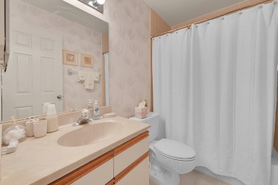 YOU'LL INSTANTLY FEEL AT HOME WHEN YOU STEP INTO THIS VAULTEDV on The Boca Country Club in Florida - for sale on GolfHomes.com, golf home, golf lot