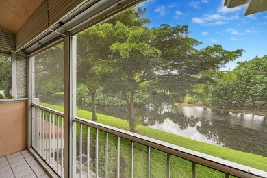 YOU'LL INSTANTLY FEEL AT HOME WHEN YOU STEP INTO THIS VAULTEDV on The Boca Country Club in Florida - for sale on GolfHomes.com, golf home, golf lot