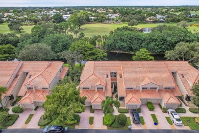 YOU'LL INSTANTLY FEEL AT HOME WHEN YOU STEP INTO THIS VAULTEDV on The Boca Country Club in Florida - for sale on GolfHomes.com, golf home, golf lot