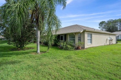 This end-unit Sea Breeze Villa nestled within Pine Meadow on Heritage Pines Country Club in Florida - for sale on GolfHomes.com, golf home, golf lot
