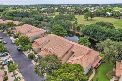 YOU'LL INSTANTLY FEEL AT HOME WHEN YOU STEP INTO THIS VAULTEDV on The Boca Country Club in Florida - for sale on GolfHomes.com, golf home, golf lot