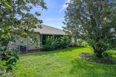 This end-unit Sea Breeze Villa nestled within Pine Meadow on Heritage Pines Country Club in Florida - for sale on GolfHomes.com, golf home, golf lot