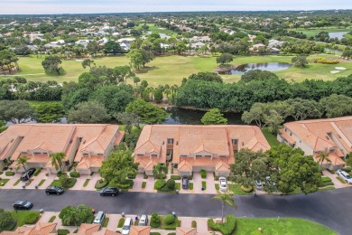 YOU'LL INSTANTLY FEEL AT HOME WHEN YOU STEP INTO THIS VAULTEDV on The Boca Country Club in Florida - for sale on GolfHomes.com, golf home, golf lot