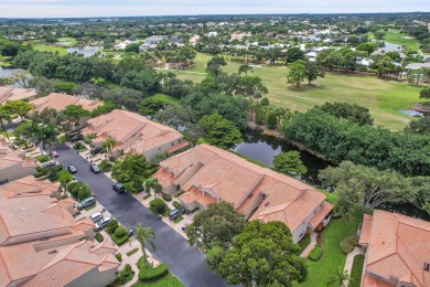 YOU'LL INSTANTLY FEEL AT HOME WHEN YOU STEP INTO THIS VAULTEDV on The Boca Country Club in Florida - for sale on GolfHomes.com, golf home, golf lot