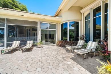 Luxury meets tranquility in this stunning 3,794sf 4-bedroom on BallenIsles Golf and Country Club in Florida - for sale on GolfHomes.com, golf home, golf lot
