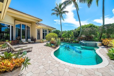 Luxury meets tranquility in this stunning 3,794sf 4-bedroom on BallenIsles Golf and Country Club in Florida - for sale on GolfHomes.com, golf home, golf lot